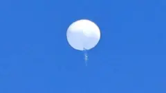 The first balloon, which was spotted over the United States, before it was shot down off the South Carolina coast