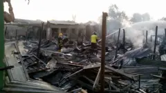 Fire fighters dey quench di fire