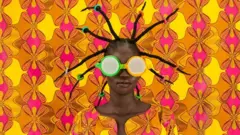 Woman disguised by colourful fabric