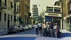 The gang in front of the bus in Pisa