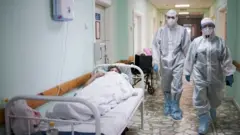 врачи