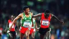 አትሌት ኃይሌ ገብረ ሥላሴ ፖል ቴርጋትን ሲያሸንፍ