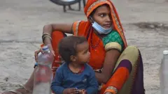 લૉકડાઉનથી પીડિત પરિવારની તસવીર