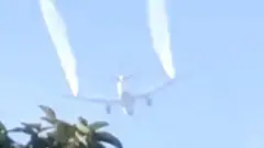 Plane dumps fuel over school