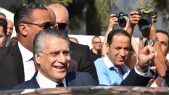 Le candidat Nabil Karoui après son vote lors du second tour de la présidentielle en Tunisie