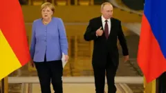 Putin and Merkel