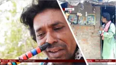 ముక్కుతో ఫ్లూట్ వాయిస్తున్న గుజరాతీ కళాకారుడు