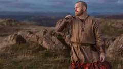 Рыжий воин в шотландских горах