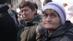 Женщина на митинге