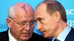 Mikhail Gorbachev and Vladimir Putin in 2004