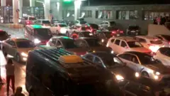 A queue or cars at a border checkpoint