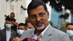 अर्थमन्त्री शर्मा