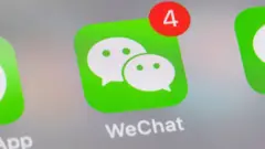 smart phone with the icons for the social networking apps WeChat and others