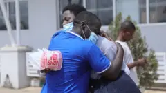 For di airport parents hug dia pikin, some pipo even cry as dem land for di kontri