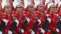 Chinese troops march past Tiananmen Square during a rehearsal before a military parade marking the 70th anniversary of the founding of the People"s Republic of China, in Beijing, China, 01 October 2019.