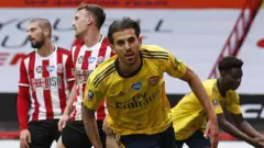 Dani Ceballos celebrates