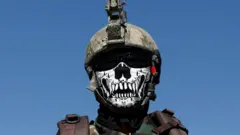 An Afghan Special Forces member attends his graduation ceremony in Kabul, Afghanistan, 17 June