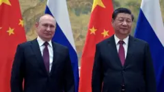 Vladimir Putin y Xi Jinping.