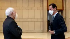 محمد جواد ظریف، وزیر خارجه ایران، حدود یک ماه پیش با وجود محدودیت‌های مربوط به شیوع کرونا برای دیدار با بشار اسد به سوریه سفر کرد