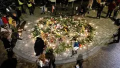 Mourners during the commemoration of a teacher in Arnhem on 7 November