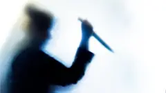 খুন করার প্রতিকী ছবি