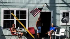 Men sitting outside in Georgia