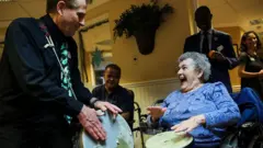 people singing with music instruments