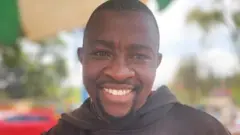 Simon Macharia Wangũi ayaa sheegay in uu ku qanacsan yahay in magaciisa dambe uu yahay mid dumar