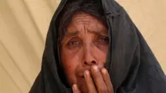 နေရာ‌ရွှေ့ပြောင်းလာတဲ့ ကန်ဒဟာမြို့က အမျိုးသမီး။ အစားအစာပြတ်လပ်မှုနဲ့ အာဖဂန်တစ်ဝက် ရင်ဆိုင်နေရေတယ်လို့ ကုလ သတိပေး