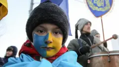 українець