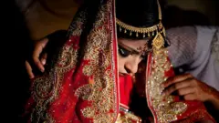 Woman wey dey prepare for Bangladesh