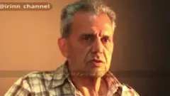 در ابتدای فیلمی که شبکه خبر پخش کرده این شخص خود را جمشید شارمهد معرفی می‌کند و سپس تصویر او با چشم‌بند دیده می‌شود