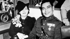 Batista y esposa