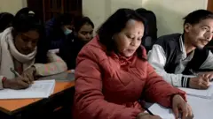 रात्रि स्कुलका विद्यार्थी।