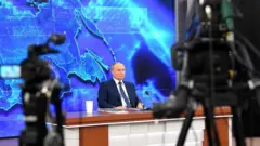 Путин