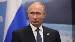 путін