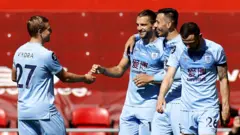 Jay Rodriguez (centre) celebrates scoring against Liverpool