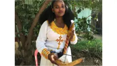 እዝግሄሩ ገብረኣብዝጊ