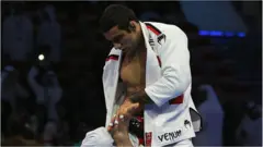(L-R) Victor Estima competing with Leandro Lo in the Abu Dhabi World Professional Jiu-Jitsu Championship Abu Dhabi, United Arab Emirates in 2014.