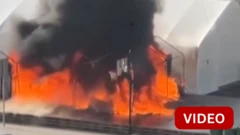 செர்பியா நாடாளுமன்றம் வெளியே துப்பாக்கிச்சூடு; தீ வைப்பு