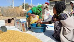 እርዳታ የሚቀበሉ ሴቶች