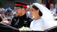 প্রিন্স হ্যারি ও মেগান।