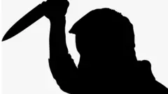 Aworan ojiji ẹni to mu ọbẹ lọwọ
