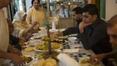 family gathering in table for food