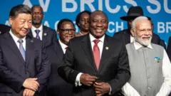 South African President Cyril Ramaphosa with fellow Brics leaders President of China Xi Jinping and Prime Minister of India Narendra Modi pose for a family photo