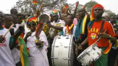 Group of pipo wey dey celebrate during Ghana 50 years independence celebration for Accra.