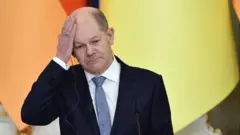 Олаф Шольц