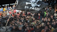 St Pauli fan waves a club flag