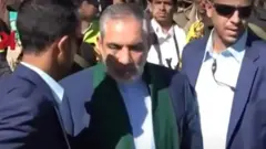 حسن إيرلو في وسط الصورة