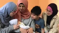 Niyara Mamutova with her four children